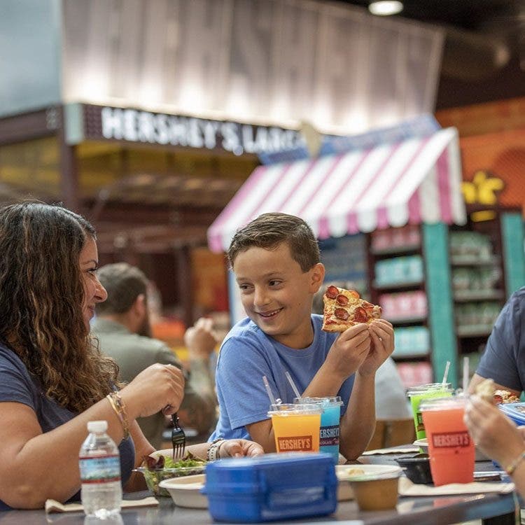 family eating together in hersheys chocolate world food hall